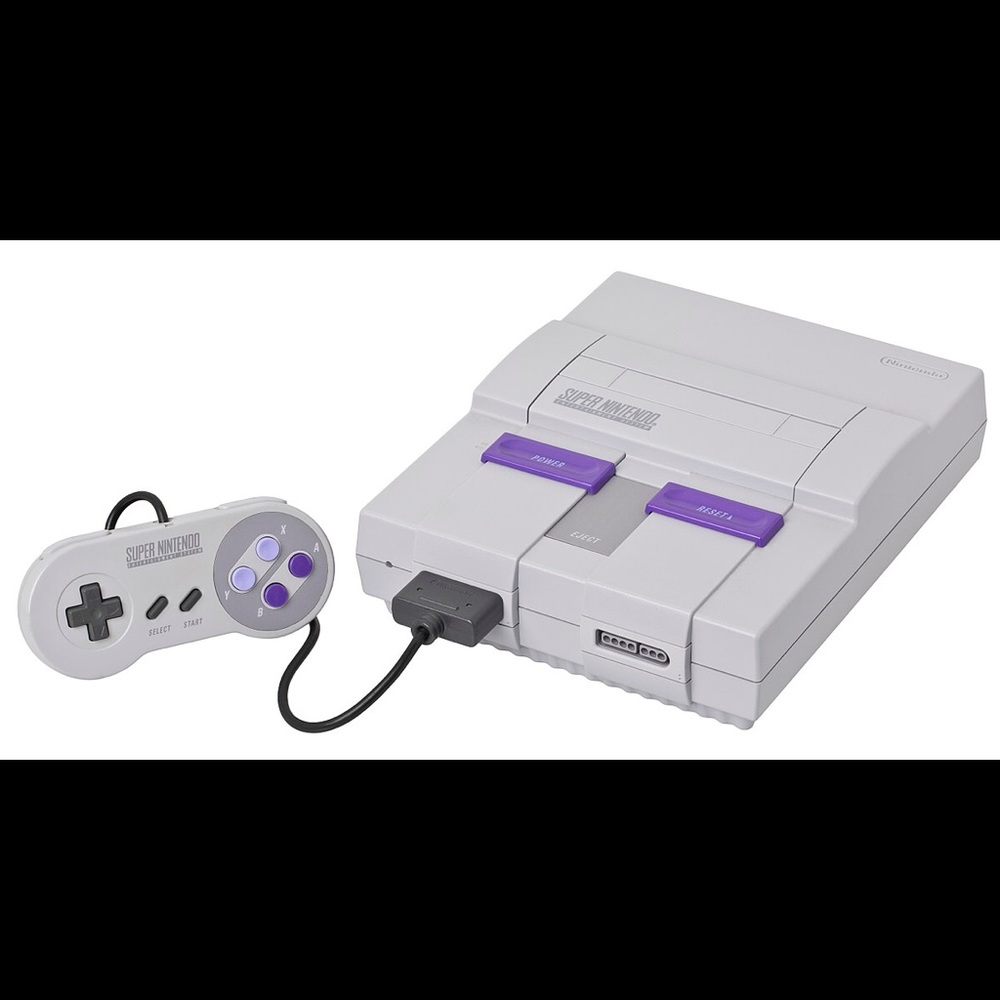 SNES Super Nintendo comes with controllers